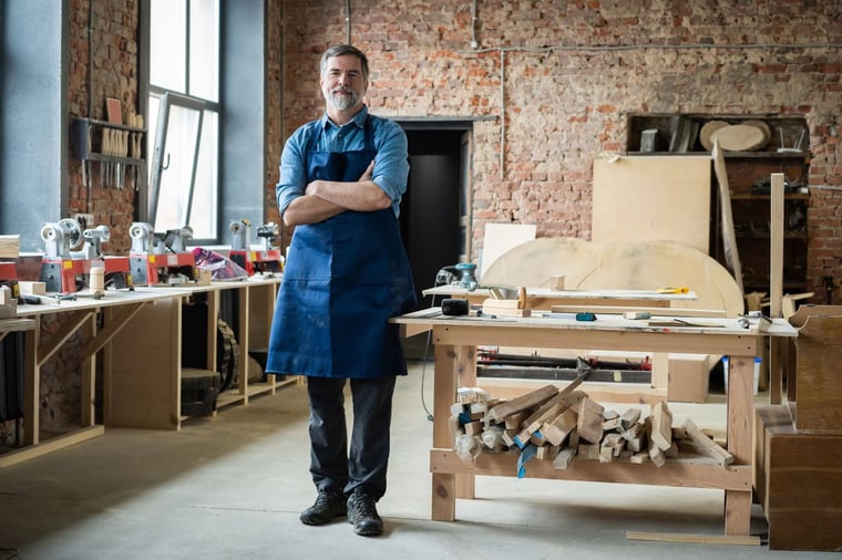 A cabinet maker in a workshop